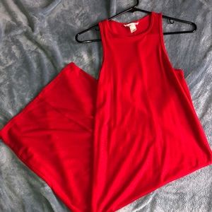 Tight fitting red dress.